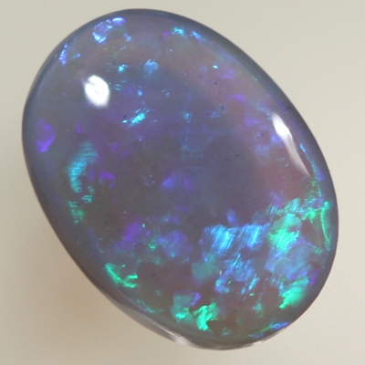 SOLID BLACK CRYSTAL OPAL 8 x 6 mm Crispy bright green over purple